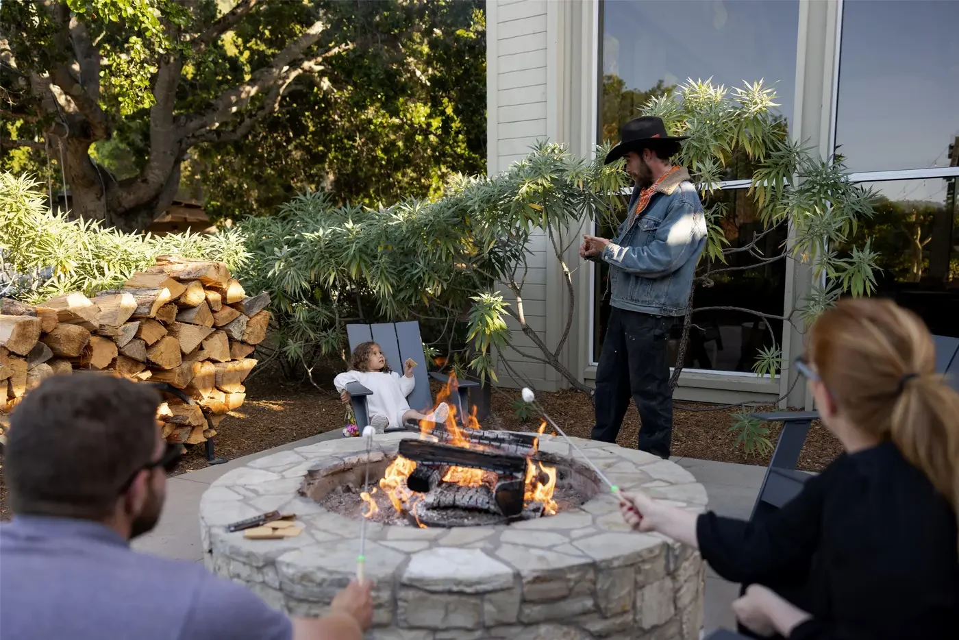 Carmel Valley Ranch — Guests around a fire pit at Carmel Valley Ranch