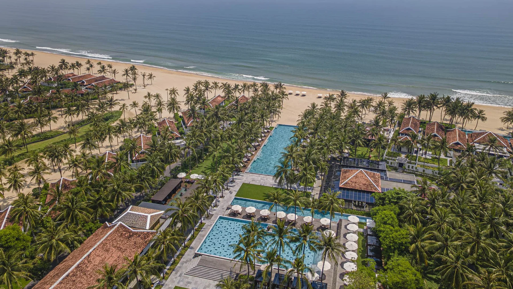 Four Seasons The Nam Hai — Aerial view of the actual Nam Hai resort pools and beach